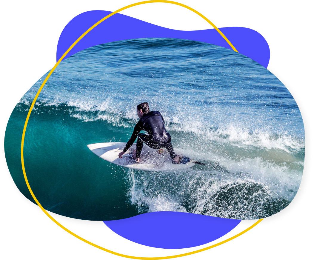 Image of a person surfing a wave.